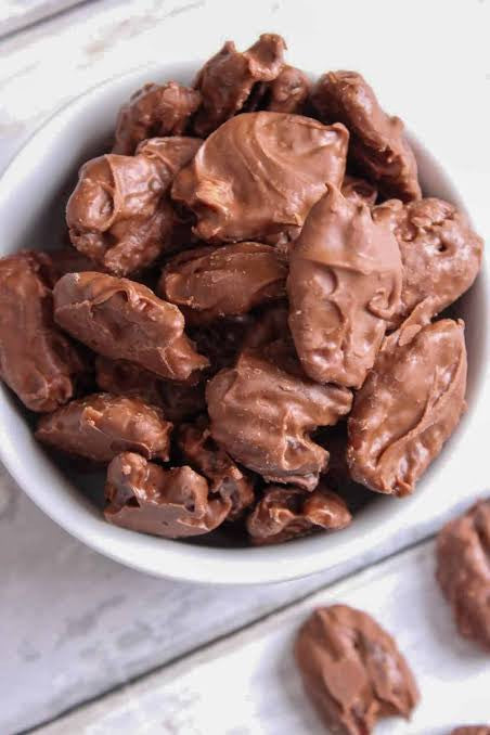CHOCOLATE COVERED PECANS 1/2#